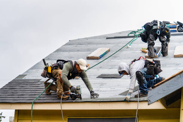 Professional Roofing technician working in Leawood, KS
